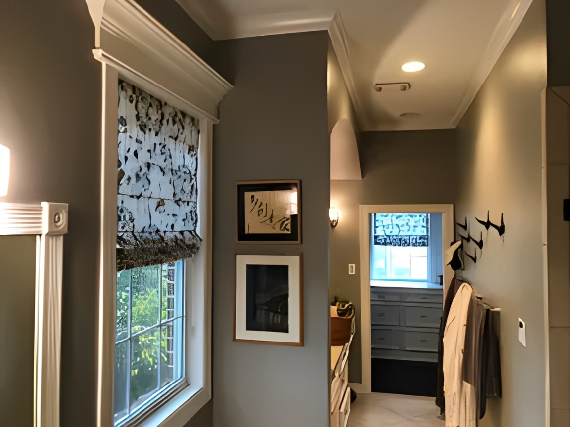 Elegant bathroom featuring towels and artwork.