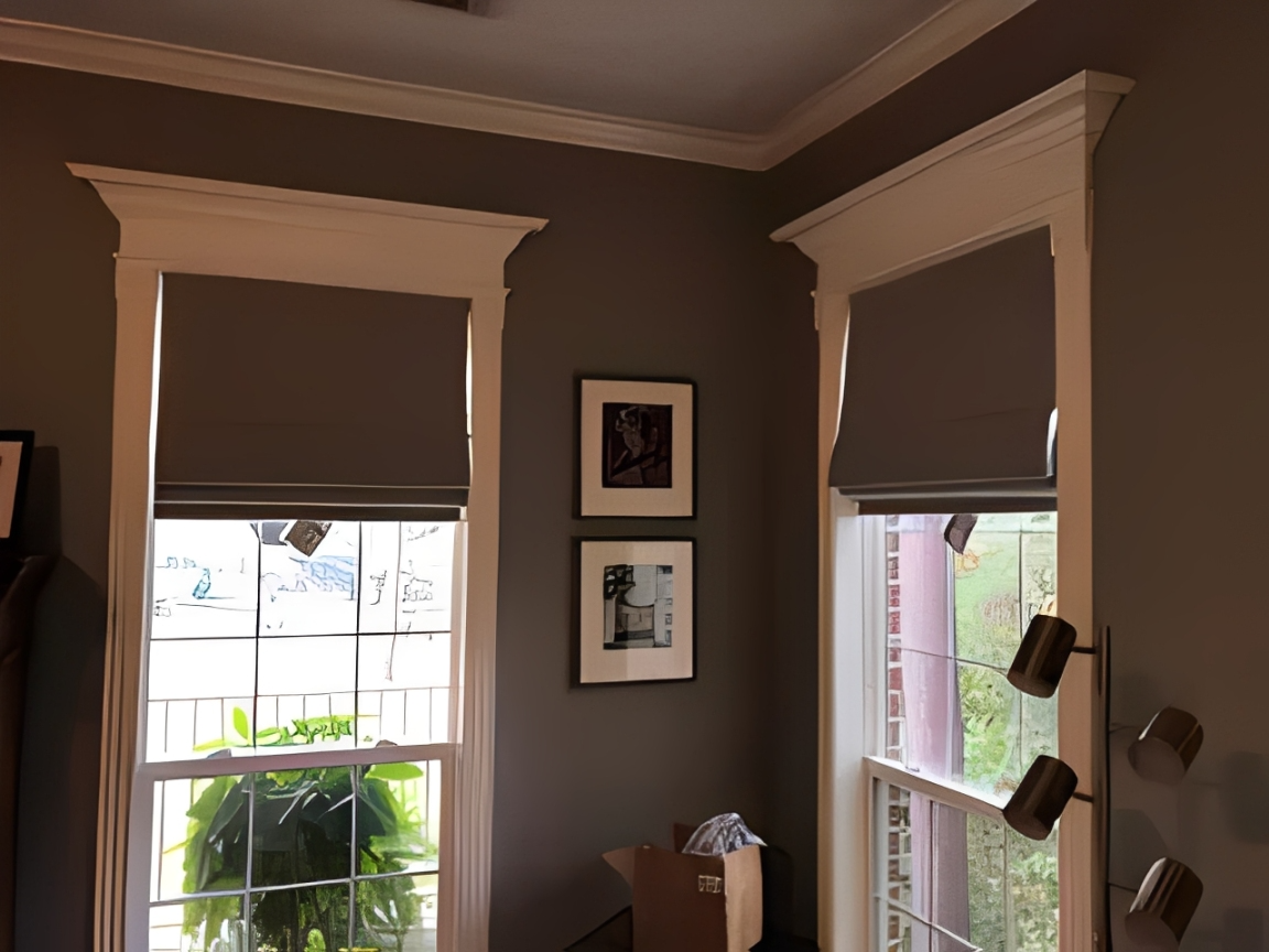 Modern interior with framed art and blinds
