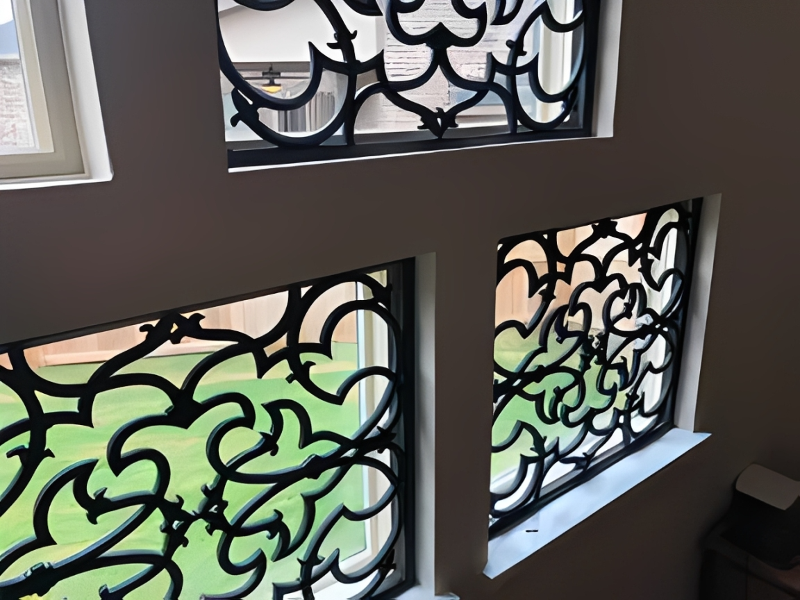 Artistic window with patterned grills