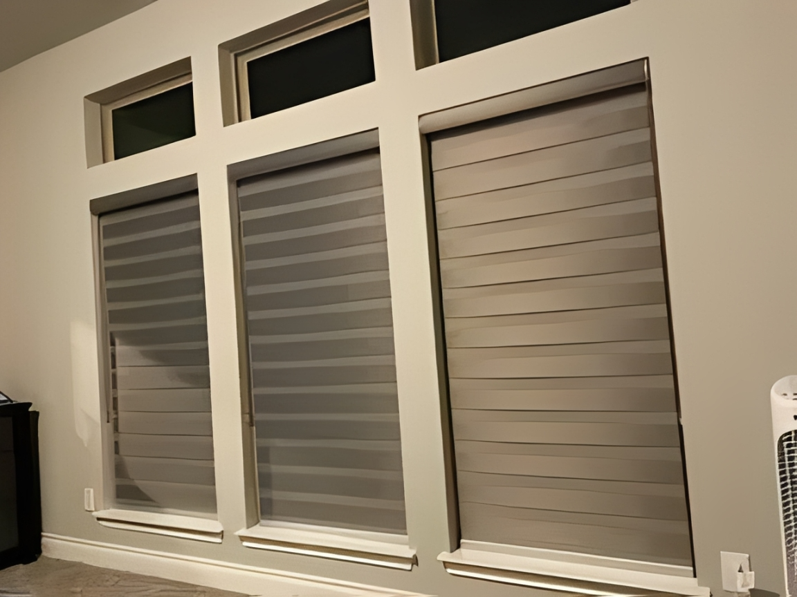 Contemporary window coverings in neutral room