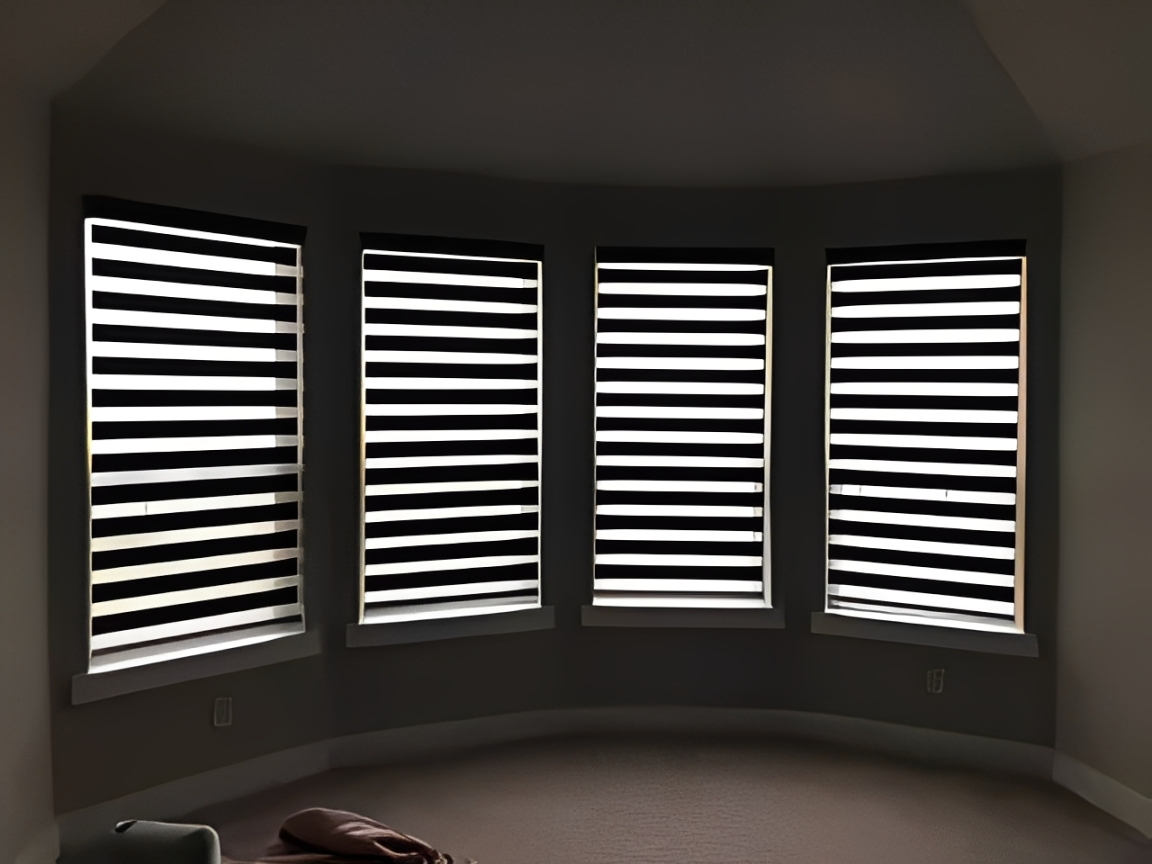 Striped blinds in a curved room
