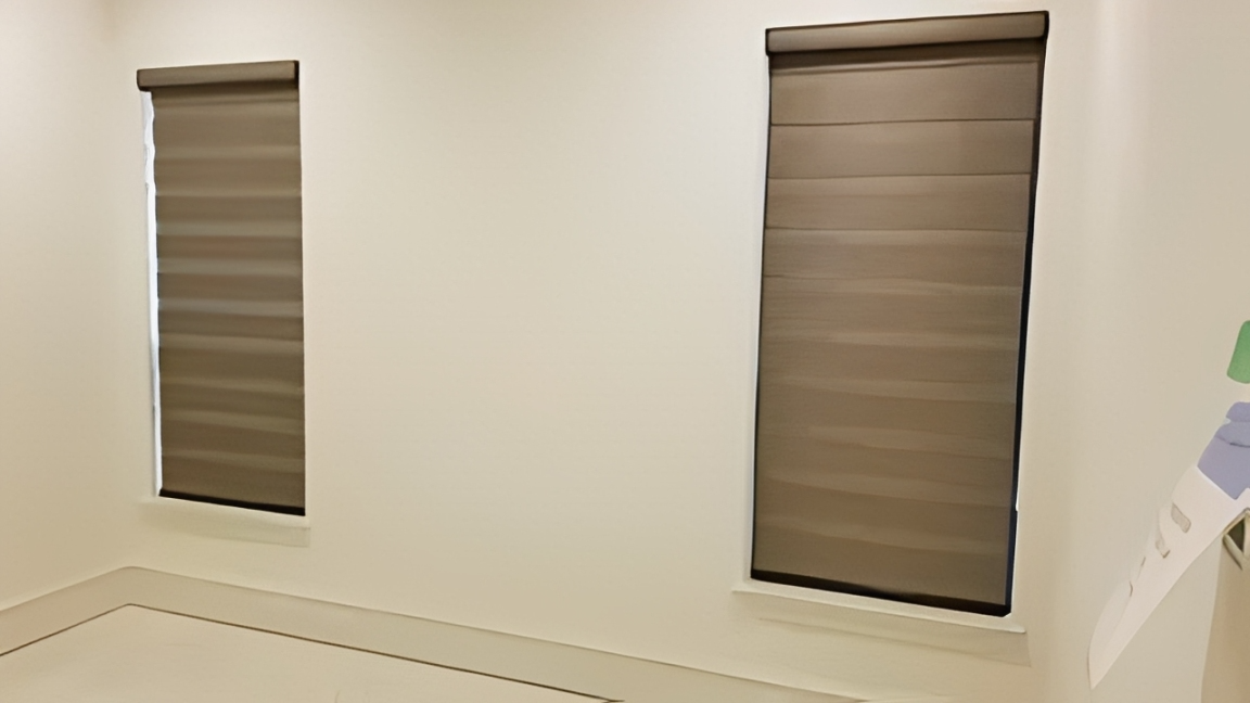 Minimalist room with window coverings.