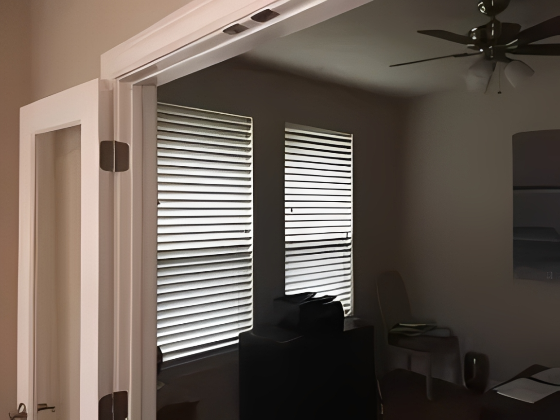 Office space with French doors and blinds