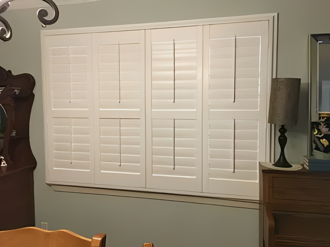 White shutters on a window