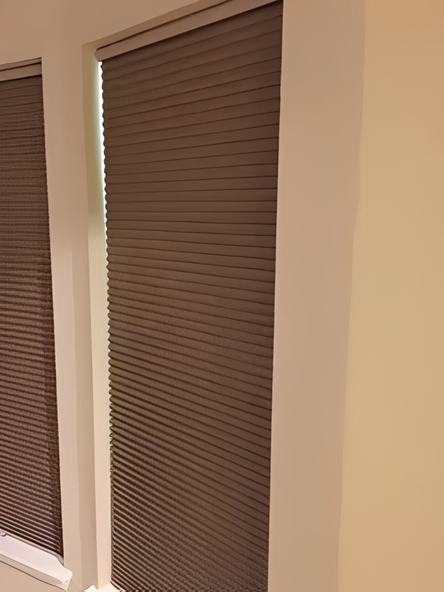 Indoor view of brown window blinds