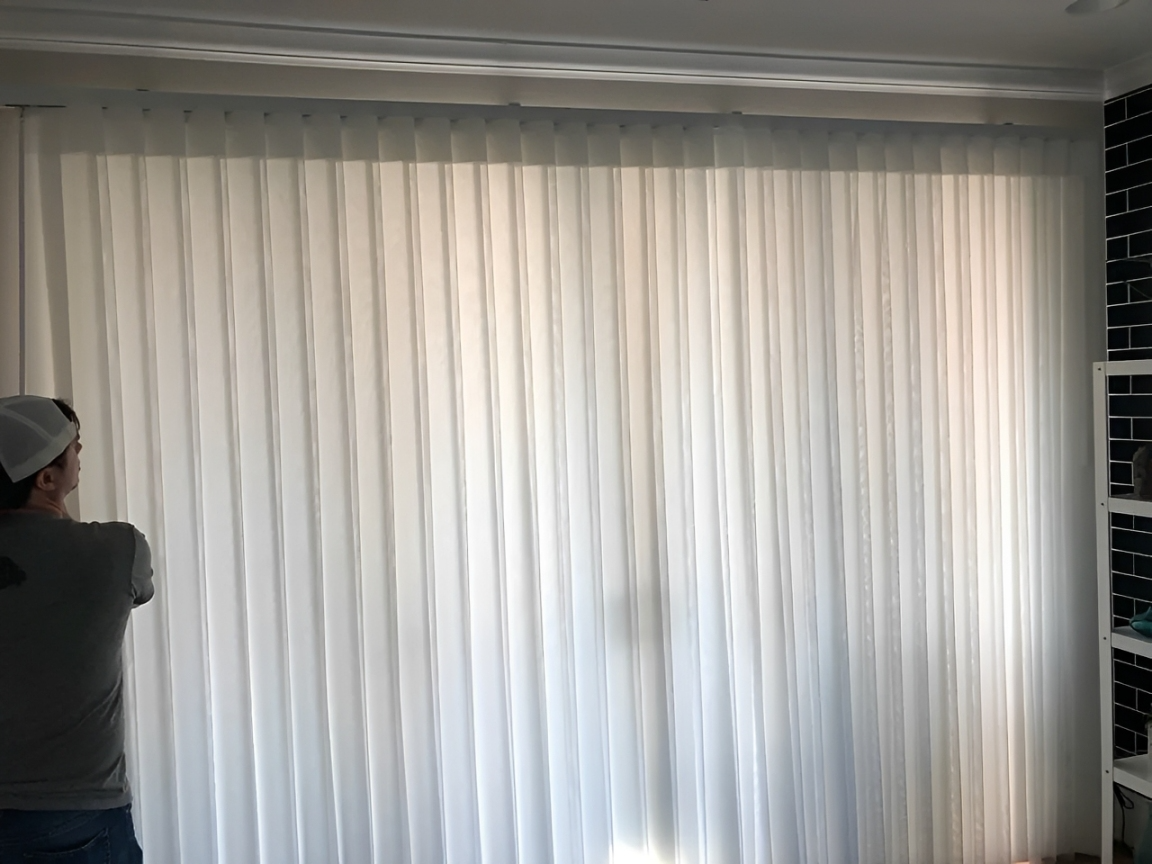 Room with closed vertical window blinds