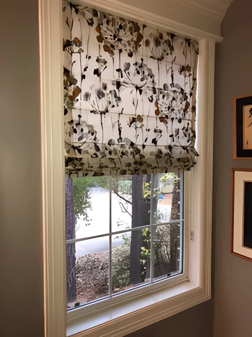 Floral Roman shade on window