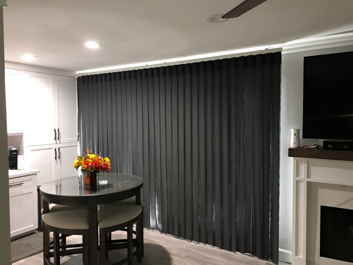 Dining area with black curtains