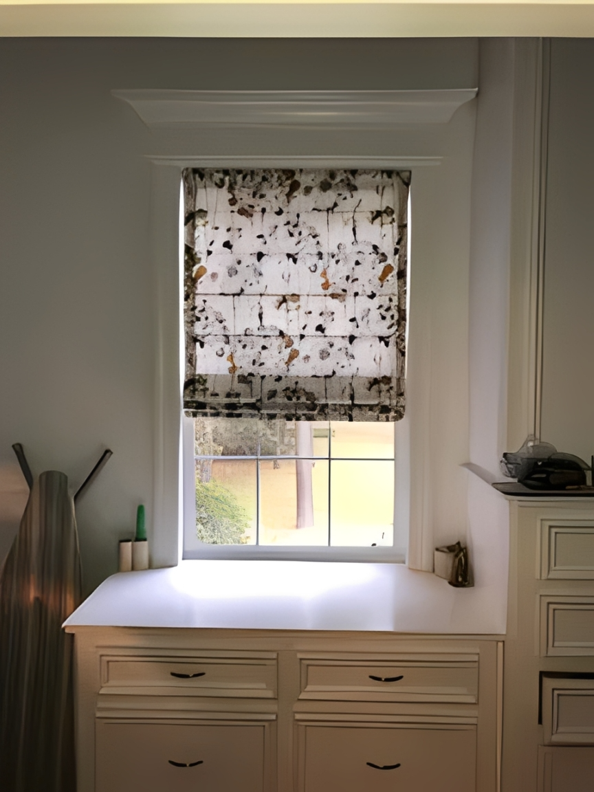 Kitchen window with decorative curtain