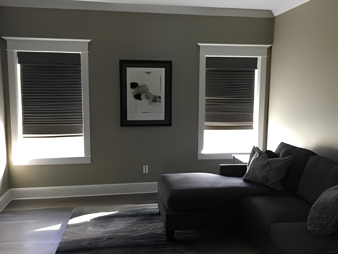 Minimalist room with couch and artwork